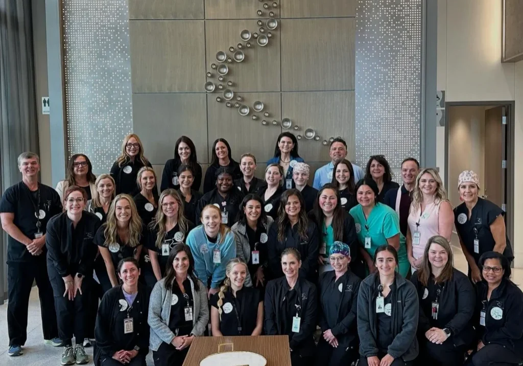 ReCenter healthcare professionals pose together indoors at a the breast cancer center